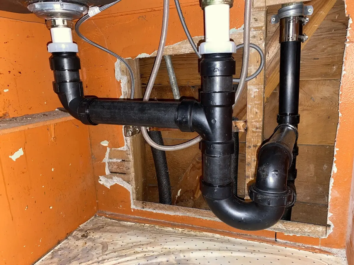 Professional Garbage Disposal Repair equipment and tools on the job in Independence